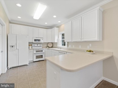 This spacious five-bedroom home invites you into the vibrant on Baywood Greens Golf Club in Delaware - for sale on GolfHomes.com, golf home, golf lot