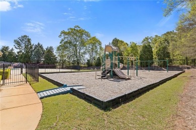 Welcome to luxury living in the prestigious gated Crystal Lake on Crystal Lake Golf and Country Club in Georgia - for sale on GolfHomes.com, golf home, golf lot