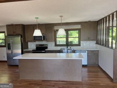 This beautiful completely remolded Home in Sky Valley offers one on Sky Valley Resort and Country Club in Georgia - for sale on GolfHomes.com, golf home, golf lot