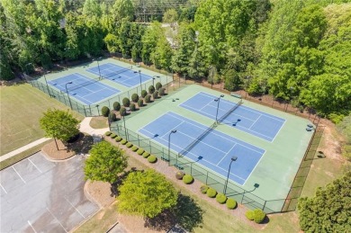 Welcome to luxury living in the prestigious gated Crystal Lake on Crystal Lake Golf and Country Club in Georgia - for sale on GolfHomes.com, golf home, golf lot