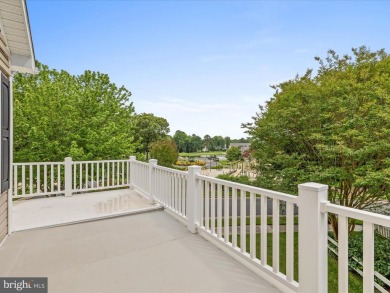 This spacious five-bedroom home invites you into the vibrant on Baywood Greens Golf Club in Delaware - for sale on GolfHomes.com, golf home, golf lot