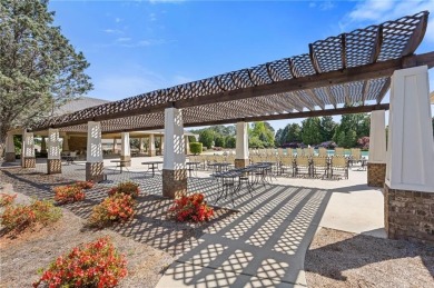 Welcome to luxury living in the prestigious gated Crystal Lake on Crystal Lake Golf and Country Club in Georgia - for sale on GolfHomes.com, golf home, golf lot