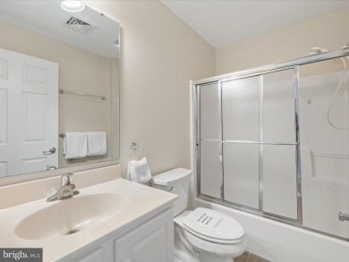 This spacious five-bedroom home invites you into the vibrant on Baywood Greens Golf Club in Delaware - for sale on GolfHomes.com, golf home, golf lot