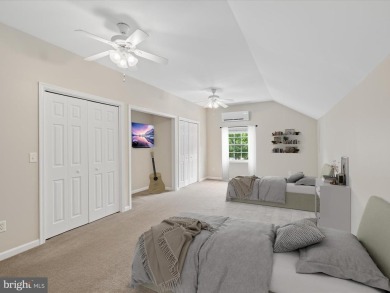 This spacious five-bedroom home invites you into the vibrant on Baywood Greens Golf Club in Delaware - for sale on GolfHomes.com, golf home, golf lot