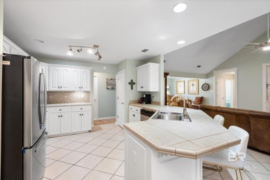 You'll fall in love with this Creole cottage-style home nestled on Isle Dauphine Club Golf Course in Alabama - for sale on GolfHomes.com, golf home, golf lot
