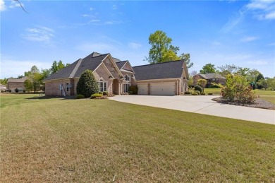 Welcome to luxury living in the prestigious gated Crystal Lake on Crystal Lake Golf and Country Club in Georgia - for sale on GolfHomes.com, golf home, golf lot
