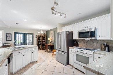 You'll fall in love with this Creole cottage-style home nestled on Isle Dauphine Club Golf Course in Alabama - for sale on GolfHomes.com, golf home, golf lot