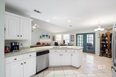 You'll fall in love with this Creole cottage-style home nestled on Isle Dauphine Club Golf Course in Alabama - for sale on GolfHomes.com, golf home, golf lot