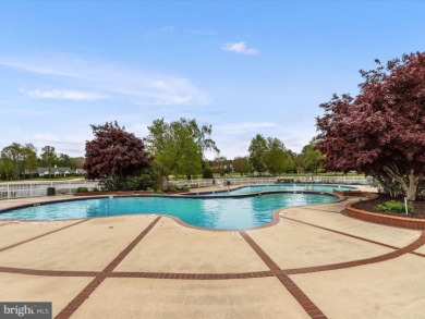 This spacious five-bedroom home invites you into the vibrant on Baywood Greens Golf Club in Delaware - for sale on GolfHomes.com, golf home, golf lot