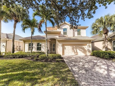 Enjoy breathtaking sunsets and a stunning lake view from this on Shadow Wood Country Club in Florida - for sale on GolfHomes.com, golf home, golf lot