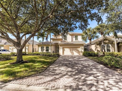 Enjoy breathtaking sunsets and a stunning lake view from this on Shadow Wood Country Club in Florida - for sale on GolfHomes.com, golf home, golf lot