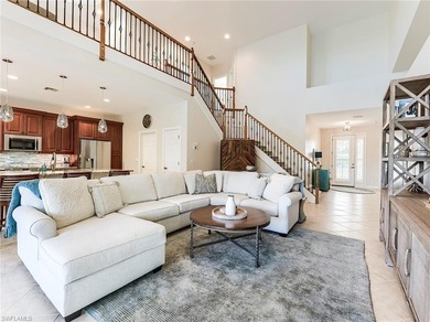 Enjoy breathtaking sunsets and a stunning lake view from this on Shadow Wood Country Club in Florida - for sale on GolfHomes.com, golf home, golf lot