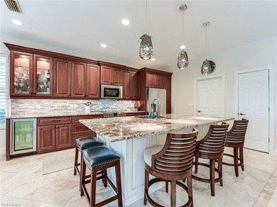 Enjoy breathtaking sunsets and a stunning lake view from this on Shadow Wood Country Club in Florida - for sale on GolfHomes.com, golf home, golf lot