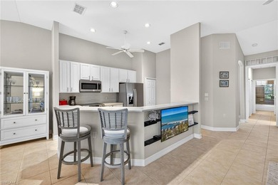 Spacious second-floor coach home is now available in Pelican on Pelican Sound Golf and River Club in Florida - for sale on GolfHomes.com, golf home, golf lot