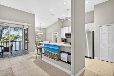 Spacious second-floor coach home is now available in Pelican on Pelican Sound Golf and River Club in Florida - for sale on GolfHomes.com, golf home, golf lot