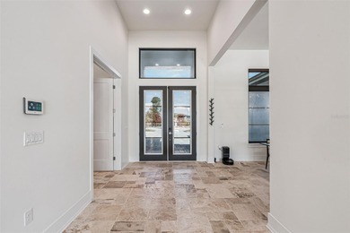 Experience refined estate living in this extraordinary 4 on Bella Collina Golf Club in Florida - for sale on GolfHomes.com, golf home, golf lot