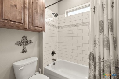 Discover the perfect blend of elegance and modern comfort in on Mill Creek Golf Club in Texas - for sale on GolfHomes.com, golf home, golf lot