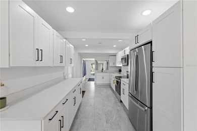 THIS IS THE ONE! Located in one of the most sought-after on Mangrove Bay Golf Course in Florida - for sale on GolfHomes.com, golf home, golf lot