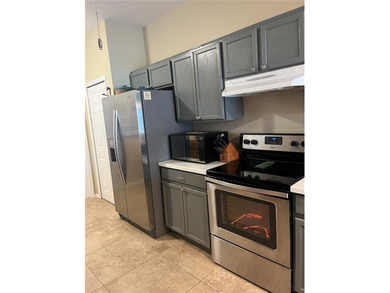 BEAUTIFUL END UNIT VILLA 2BED/2BATH/2CAR OVERSIZED GARAGE on The Groves Golf and Country Club in Florida - for sale on GolfHomes.com, golf home, golf lot