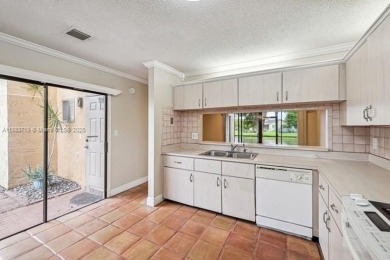 FHA AND LOW DOWNPAYMENT AVAILABLE! Discover this beautifully on Woodmont Country Club in Florida - for sale on GolfHomes.com, golf home, golf lot