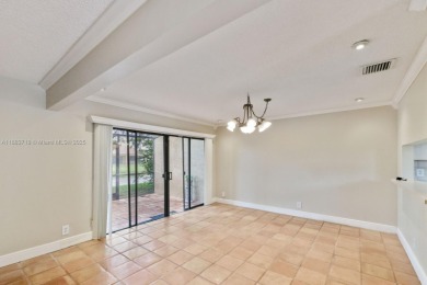 FHA AND LOW DOWNPAYMENT AVAILABLE! Discover this beautifully on Woodmont Country Club in Florida - for sale on GolfHomes.com, golf home, golf lot