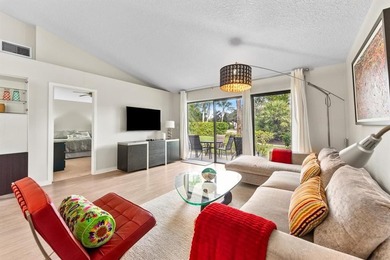 Impeccably updated 2-bed / 2-bath home in the desirable Club on PGA National Golf Club in Florida - for sale on GolfHomes.com, golf home, golf lot