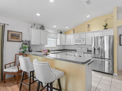 Welcome to this lovely Eagle model in Kingfisher Villas, located on The Links of Spruce Creek in Florida - for sale on GolfHomes.com, golf home, golf lot