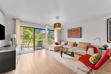 Impeccably updated 2-bed / 2-bath home in the desirable Club on PGA National Golf Club in Florida - for sale on GolfHomes.com, golf home, golf lot