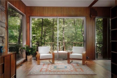 Welcome to THE FALLS.  A period correct mid-century modern on Druid Hills Golf Club in Georgia - for sale on GolfHomes.com, golf home, golf lot