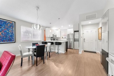 Impeccably updated 2-bed / 2-bath home in the desirable Club on PGA National Golf Club in Florida - for sale on GolfHomes.com, golf home, golf lot