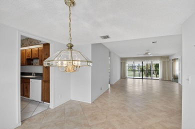 Nestled in the exclusive Quail Ridge Country Club, this 3-bed on Quail Ridge Golf Course and Country Club in Florida - for sale on GolfHomes.com, golf home, golf lot