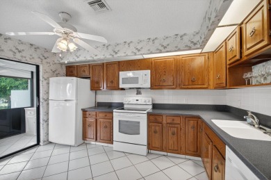 Nestled in the exclusive Quail Ridge Country Club, this 3-bed on Quail Ridge Golf Course and Country Club in Florida - for sale on GolfHomes.com, golf home, golf lot