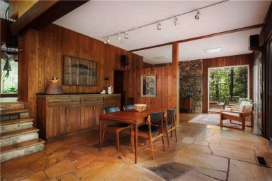 Welcome to THE FALLS.  A period correct mid-century modern on Druid Hills Golf Club in Georgia - for sale on GolfHomes.com, golf home, golf lot