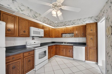 Nestled in the exclusive Quail Ridge Country Club, this 3-bed on Quail Ridge Golf Course and Country Club in Florida - for sale on GolfHomes.com, golf home, golf lot