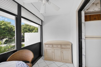 Nestled in the exclusive Quail Ridge Country Club, this 3-bed on Quail Ridge Golf Course and Country Club in Florida - for sale on GolfHomes.com, golf home, golf lot