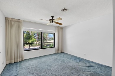Nestled in the exclusive Quail Ridge Country Club, this 3-bed on Quail Ridge Golf Course and Country Club in Florida - for sale on GolfHomes.com, golf home, golf lot
