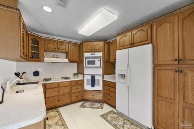 Welcome to waterfront living in the highly sought-after Santa on Tiger Point Golf and Country Club in Florida - for sale on GolfHomes.com, golf home, golf lot