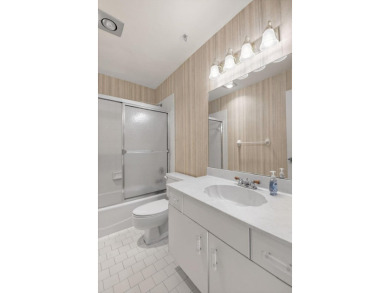 Nestled in the exclusive Quail Ridge Country Club, this 3-bed on Quail Ridge Golf Course and Country Club in Florida - for sale on GolfHomes.com, golf home, golf lot