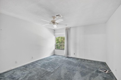 Nestled in the exclusive Quail Ridge Country Club, this 3-bed on Quail Ridge Golf Course and Country Club in Florida - for sale on GolfHomes.com, golf home, golf lot