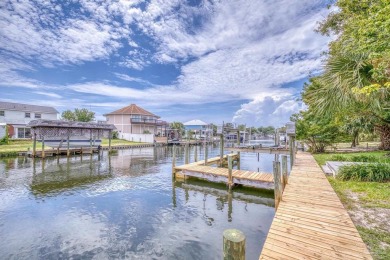 Welcome to waterfront living in the highly sought-after Santa on Tiger Point Golf and Country Club in Florida - for sale on GolfHomes.com, golf home, golf lot