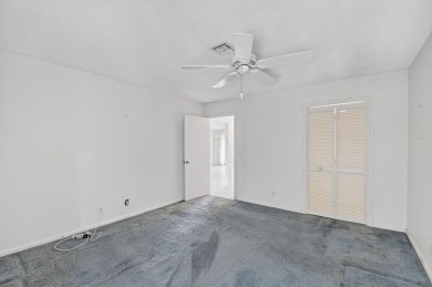Nestled in the exclusive Quail Ridge Country Club, this 3-bed on Quail Ridge Golf Course and Country Club in Florida - for sale on GolfHomes.com, golf home, golf lot