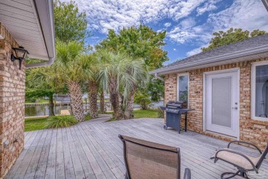 Welcome to waterfront living in the highly sought-after Santa on Tiger Point Golf and Country Club in Florida - for sale on GolfHomes.com, golf home, golf lot