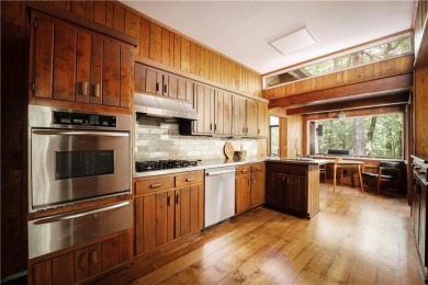 Welcome to THE FALLS.  A period correct mid-century modern on Druid Hills Golf Club in Georgia - for sale on GolfHomes.com, golf home, golf lot