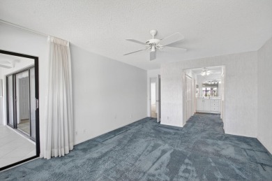 Nestled in the exclusive Quail Ridge Country Club, this 3-bed on Quail Ridge Golf Course and Country Club in Florida - for sale on GolfHomes.com, golf home, golf lot