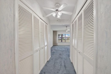 Nestled in the exclusive Quail Ridge Country Club, this 3-bed on Quail Ridge Golf Course and Country Club in Florida - for sale on GolfHomes.com, golf home, golf lot