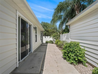 Welcome to this lovely Eagle model in Kingfisher Villas, located on The Links of Spruce Creek in Florida - for sale on GolfHomes.com, golf home, golf lot