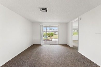 One or more photo(s) has been virtually staged. Located within on Seven Springs Golf and Country Club in Florida - for sale on GolfHomes.com, golf home, golf lot