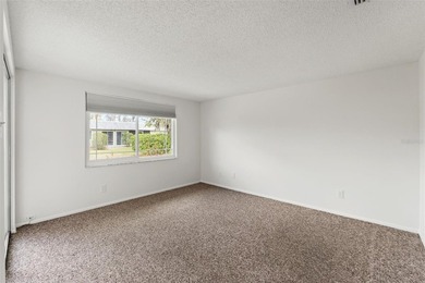 One or more photo(s) has been virtually staged. Located within on Seven Springs Golf and Country Club in Florida - for sale on GolfHomes.com, golf home, golf lot