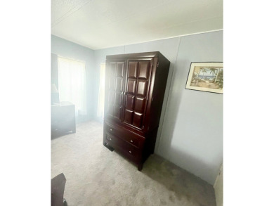 Great two bed two bath home in the gated golf community of Lake on Pine Lakes Country Club in Florida - for sale on GolfHomes.com, golf home, golf lot