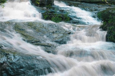 Welcome to THE FALLS.  A period correct mid-century modern on Druid Hills Golf Club in Georgia - for sale on GolfHomes.com, golf home, golf lot